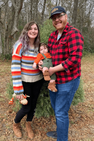 Melody Webb, her husband, and baby boy.